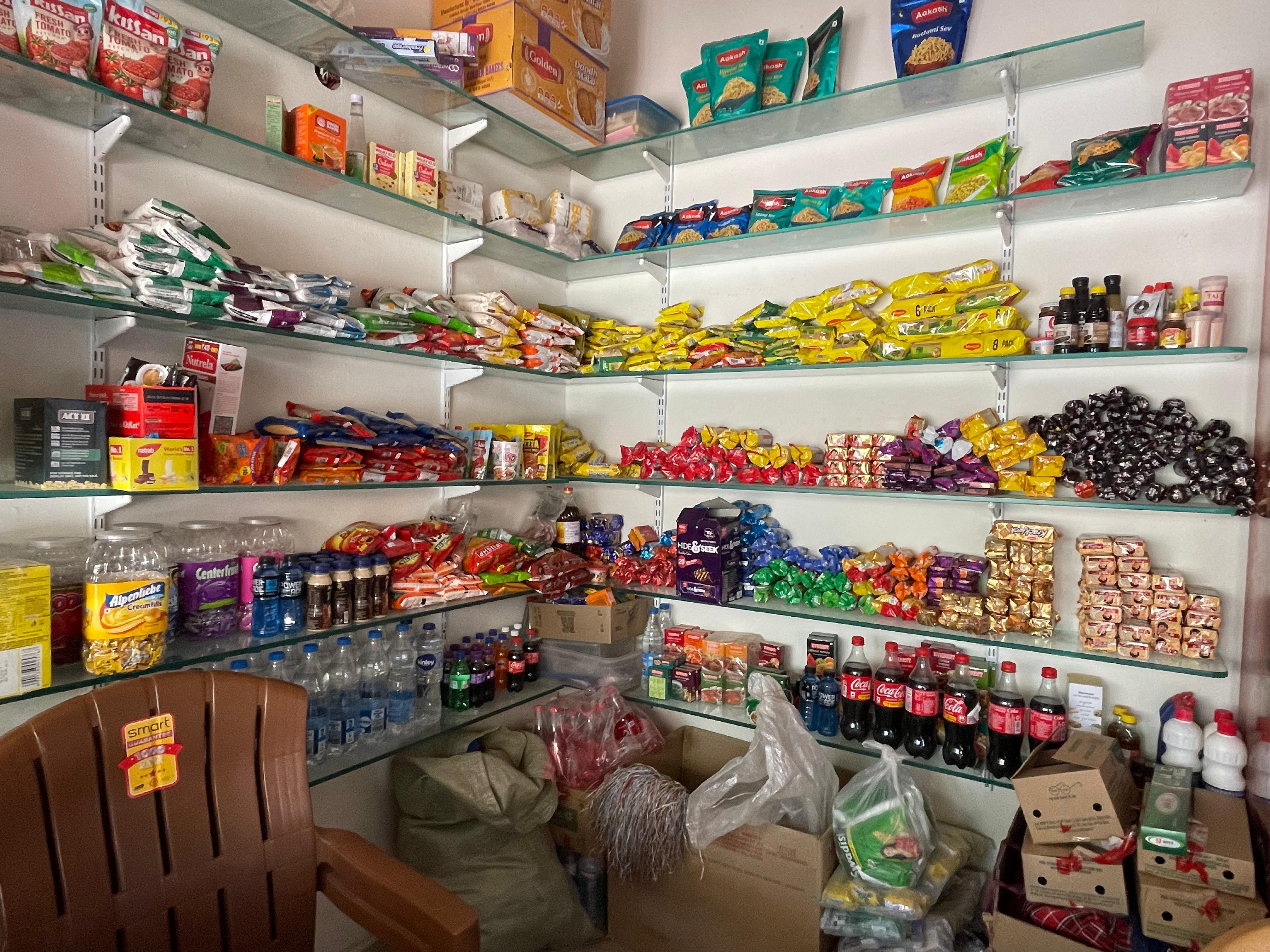 Sweets and biscuits shelves at Satnam Stores